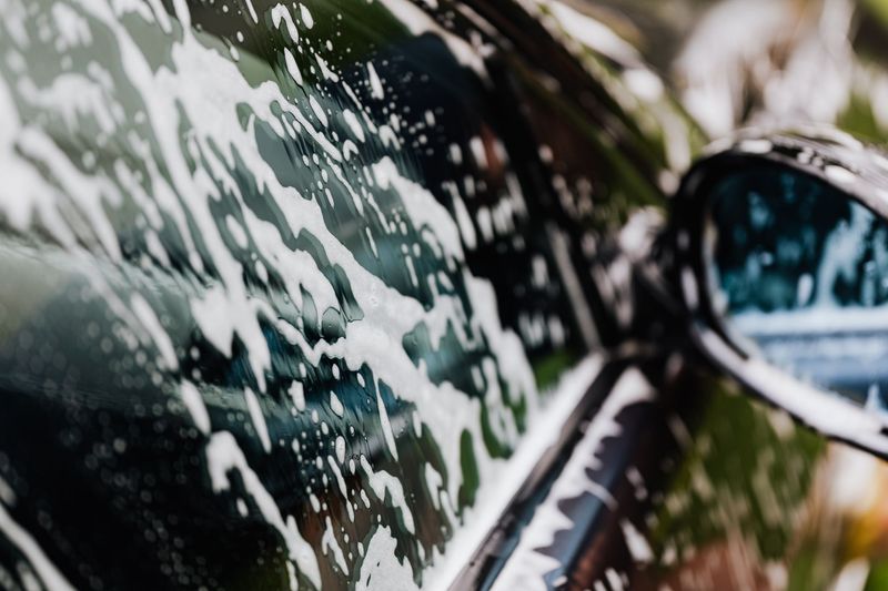 Automotive paint being polished during restoration in North Jersey, New Jersey